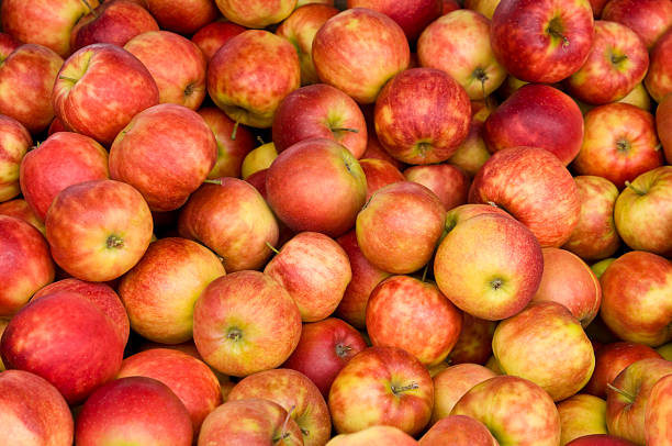 istock Many red apples at a market 187482717
