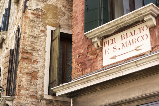 The typical street names painted in the streets of Venezia are called in local dialect 