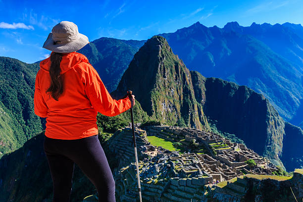 istock Female tourist looking at Machu Picchu 187483533