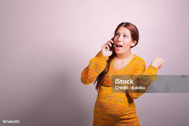 Pregnant Woman Talking On Cell Phone Stock Photo - Download Image Now - Pregnant, Terrified, Abdomen