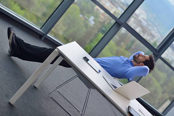 istock happy young business man at office 187485006