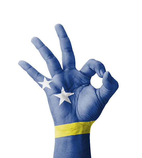 istock Hand making Ok sign, Curacao flag painted 187485470
