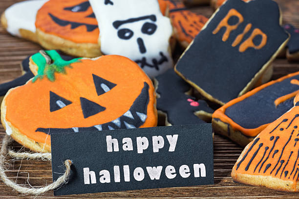 istock congratulation happy Halloween and homemade cookies 187485519
