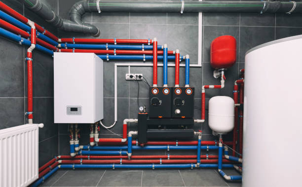 istock A modern electic boiler room. Equipment for modern heating system as a boiler, heater,pipes, expansion tank and other 1874857843