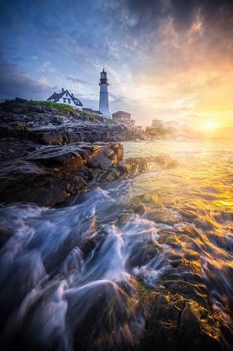 A dramatic morning at the Cape Elizabeth lighthouse located in the Fort Williams Park on Casco Bay. Portland Head Light was constructed in 1791. It is the state's oldest lighthouse, having been commissioned by George Washington and dedicated by the Marquis de Lafayette.