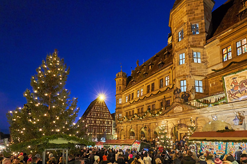 Rothenburg ob der Tauber, Germany - December 16, 2023: Crowd at the Christmas market in Rothenburg ob der Tauber.