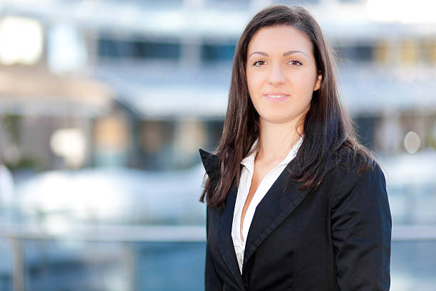 istock Beautiful businesswoman in urban setting 187490162