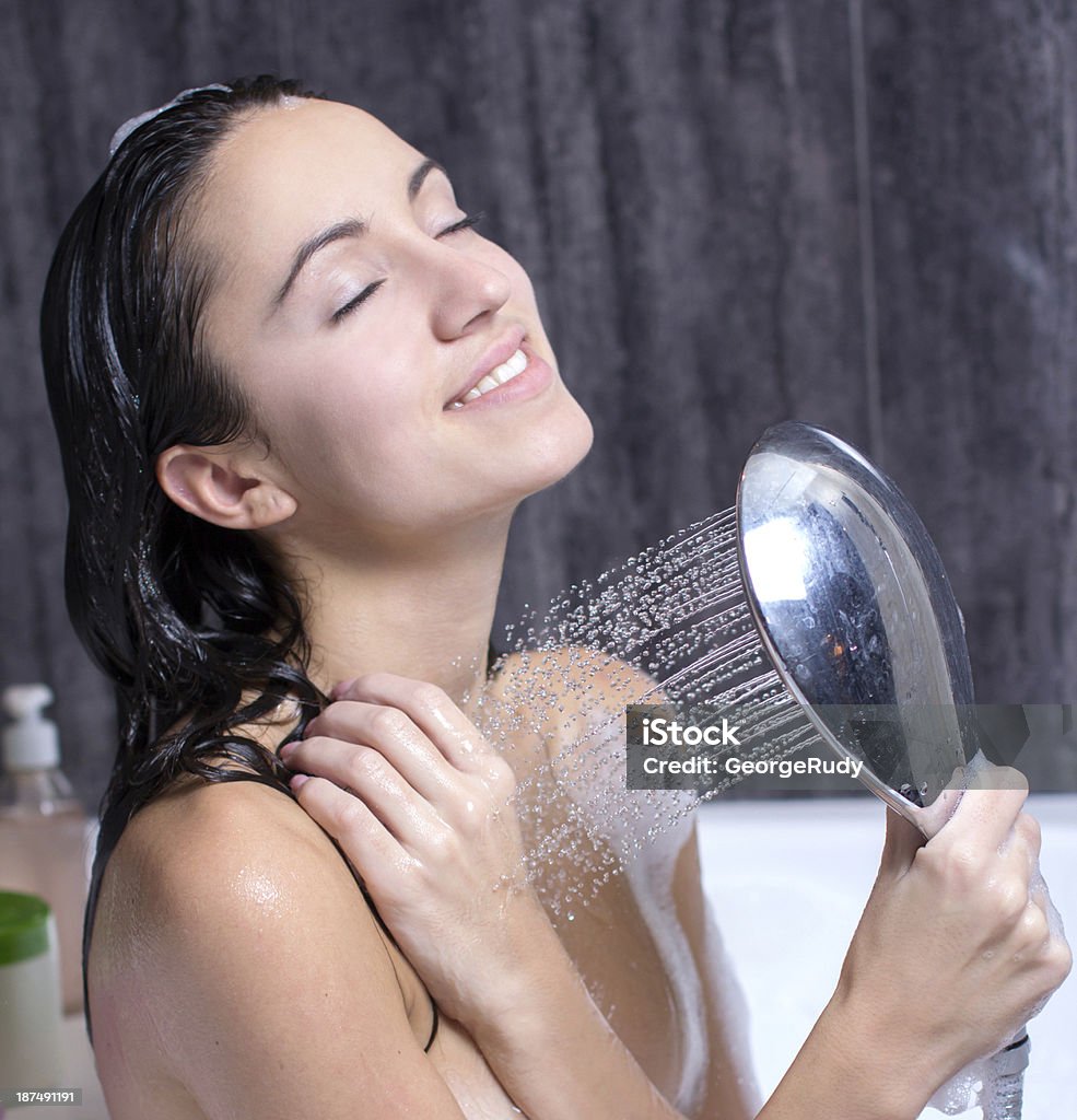 Woman Takes Bath sexy and happy young beautiful woman taking a shower 20-29 Years Stock Photo