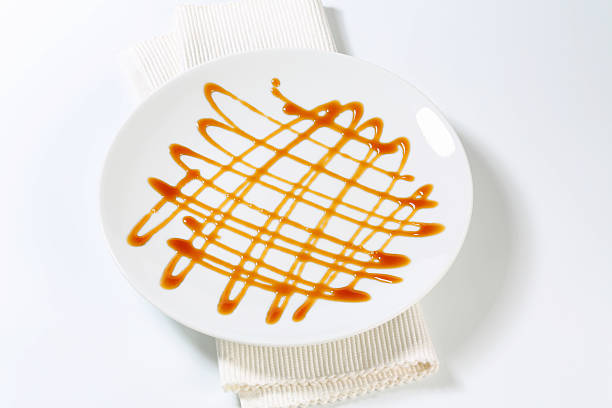 istock Flat porcelain ornated with caramel sauce 187494224