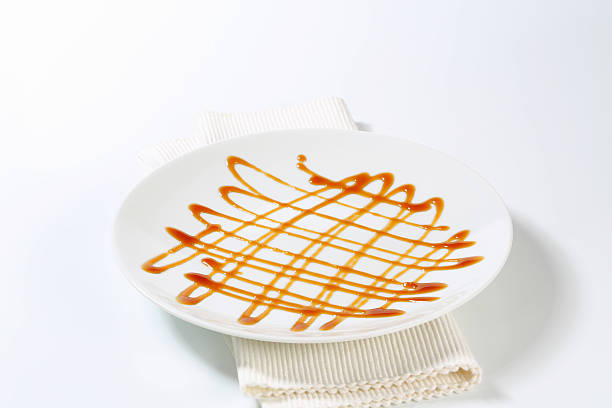 istock Flat porcelain ornated with caramel sauce 187494677