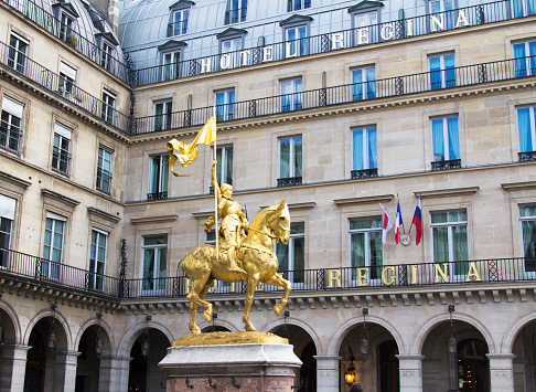 The golden statue of Saint Joan of Arc in Paris, France.