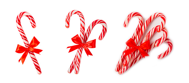 Candy cane isolated on white background. Christmas sweets. Christmas candy. New Year. A traditional sweet gift for the Christmas tree. Holiday concept.