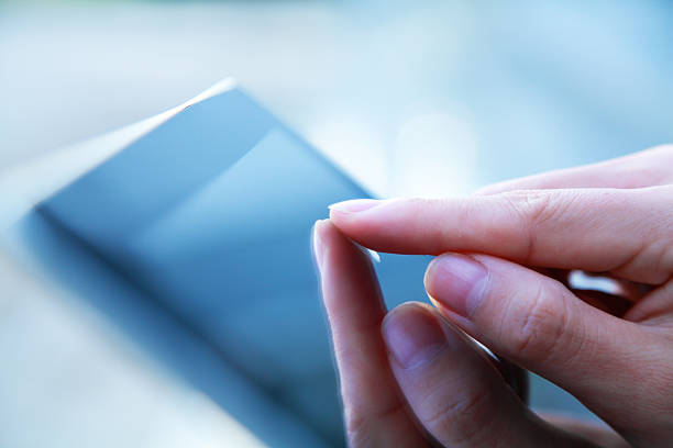 istock Business people hand holding digital tablet on light blue background 187497393