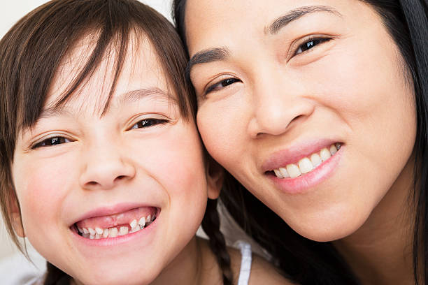 istock Mother and daughter smiling 187497457