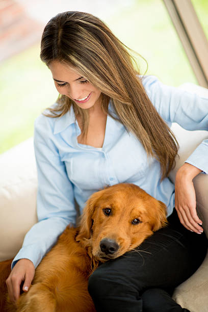 istock Woman with her dog 187497725