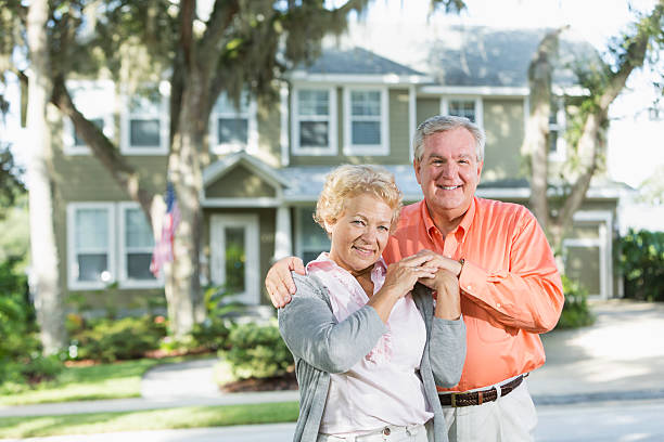 istock Senior couple outside home 187497850