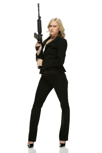 Businesswoman standing with riflehttp://www.twodozendesign.info/i/1.png