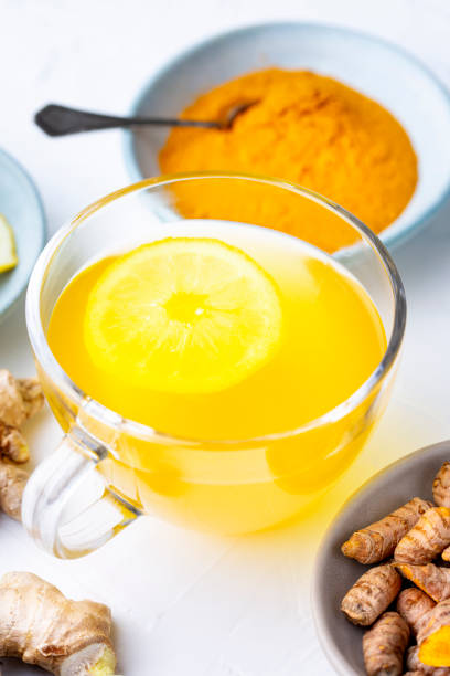 istock Curcuma longa and ginger, powder, rhizomes and tea. Complementary medicine 1874998030