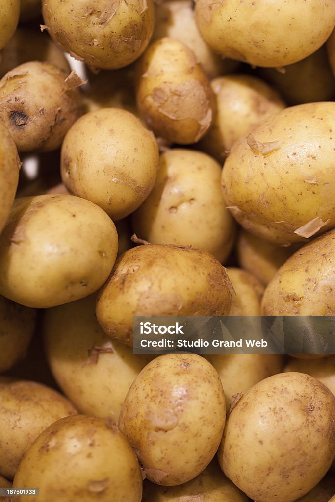 close-up su nuovi patate - Foto stock royalty-free di Agricoltura