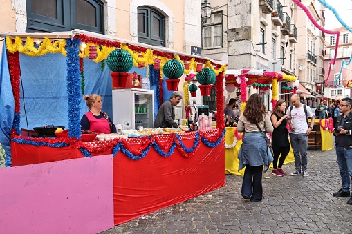 People prepare to Festa Santo Antonio in Alfama district, Lisbon, Portugal. Saint Anthony Festival is a popular street festivity, part of Festas de Lisboa.