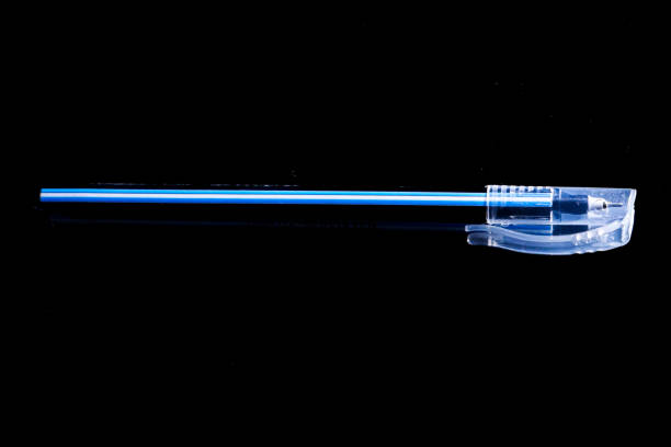 istock a ballpoint pen isolated on a black background 1875061929