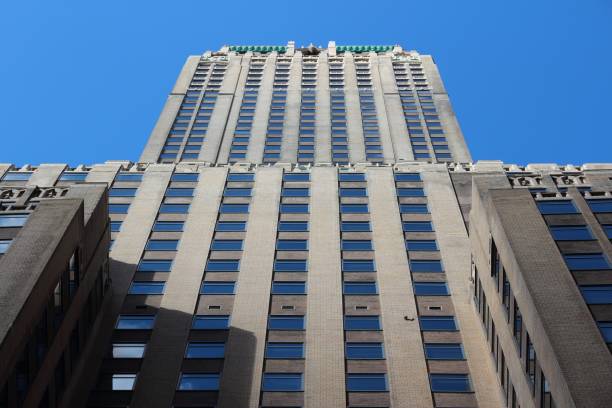 Trump Building, New York Trump Building skyscraper in New York. The 283m tall building is officially named 40 Wall Street. It is owned by Donald Trump. nassau street stock pictures, royalty-free photos & images