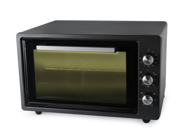 istock One electric oven isolated on white. Cooking appliance 1875087189