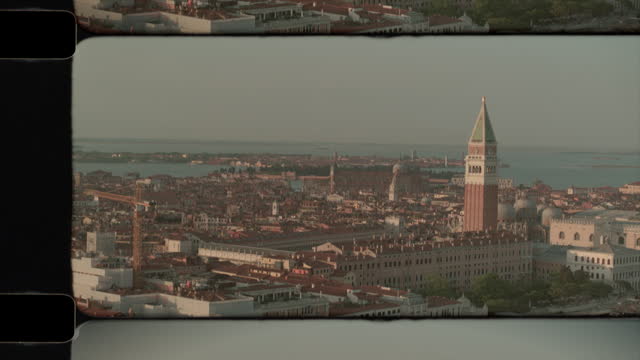 Old Film Aerial View of St. Mark's square and cathedral in Venice, Italy in sunshine. 4K
