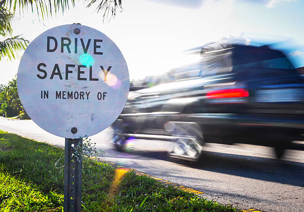 Drive Safe memorial roadside sign.