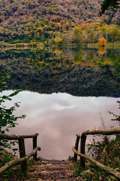istock Autumn view of Lake Ghirla 1875100699