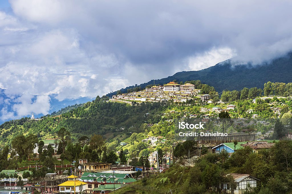 Ancient Buddhist monastery, Tawang, Arunachal Pradesh, India. The ancient 17th century Buddhist monastery with commanding views of Tawang and shrouded in cloud from over the high mountains. This shot was taken early in the morning. Arunachal Pradesh Stock Photo