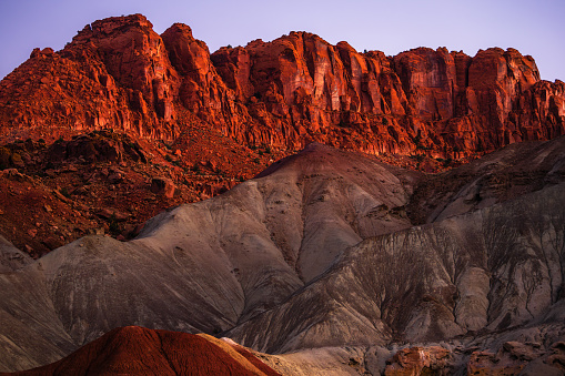 Red rock cliffs of national park Capitol Reef in Utah early in the morning dawn.