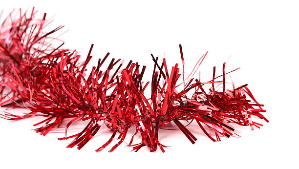 istock Close up of christmas red tinsel. 187515300