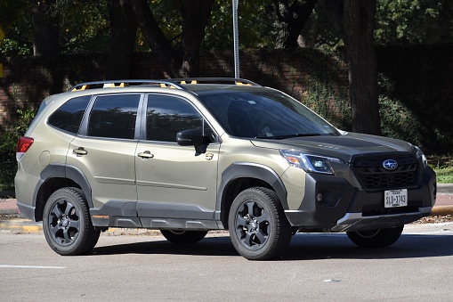 Houston, TX 12-19-2023 - A portrait of a Subaru Forester luxury SUV cruising through Herman Park, Houston TX