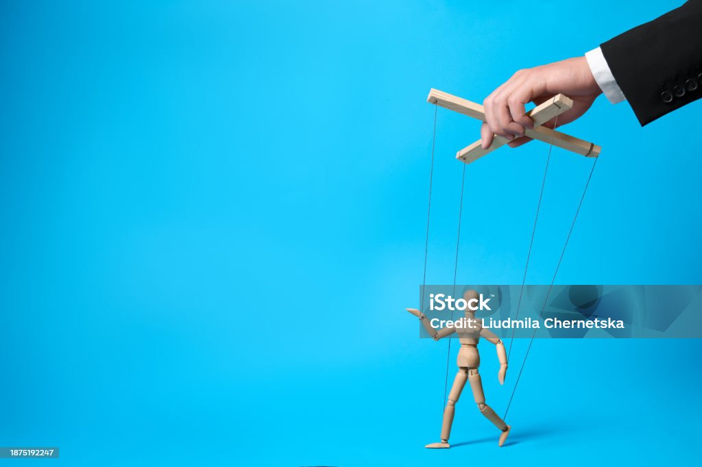 Man Stringed Puppet Man Pulling Strings Of Puppet On Light Blue Background Closeup Space ...