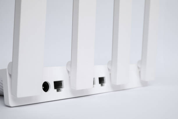 istock One modern Wi-Fi router on white background, closeup 1875206121