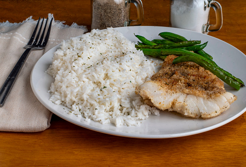 baked cod with   sauteed green beans  served  with white rice