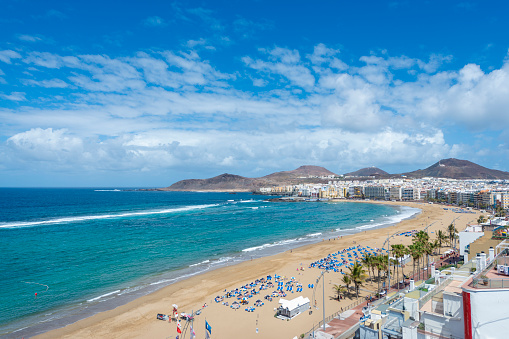Promenade of Las Canteras Beach (Playa de Las Canteras) in Las Palmas de Gran Canaria, Canary island, Spain. 3km stretch of golden sand is the heart of Las Palmas. One of the top Urban Beaches.