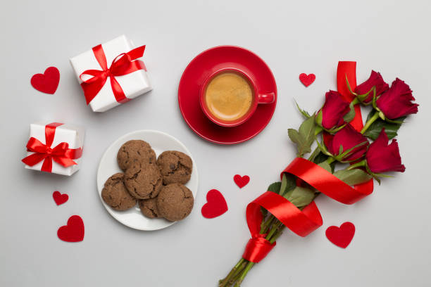 istock Gifts and breakfast for valentines day on white sheet, top view 1875235688