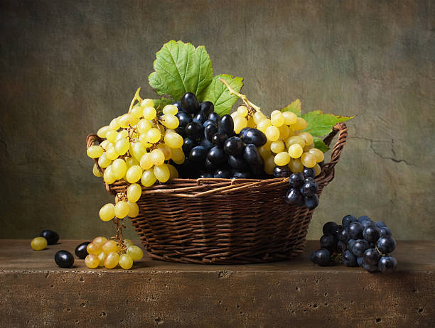 istock Still life with grapes in a basket 187526638
