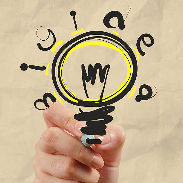 istock hand drawing light bulb with crumpled paper 187528189