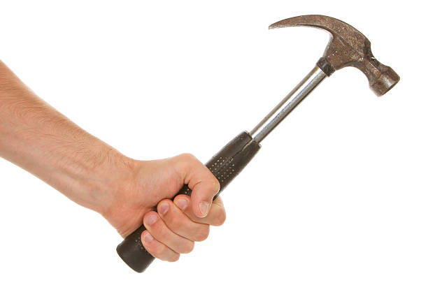 istock Man holding a old wooden hammer 187528714