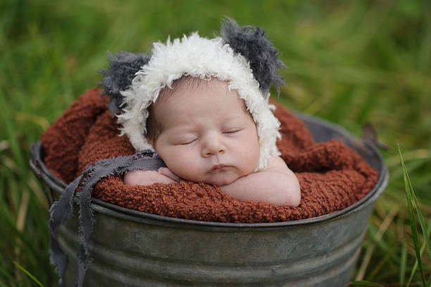 istock Sleeping Newborn Girl 187532817