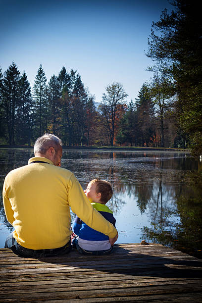 istock Father and son on the pier 187533107