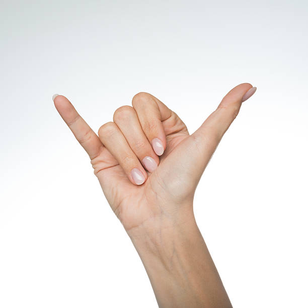 Hang Loose, Shaka, Hand Gesture Natural female Hand gesturing Hang Loose, Shaka, Hand Gesture pinky finger stock pictures, royalty-free photos & images