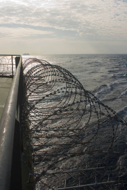 istock Vessel hardening done with razor wire and spikes 1875349417