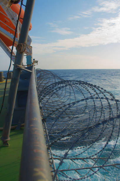 istock Vessel hardening done with razor wire and spikes 1875349422