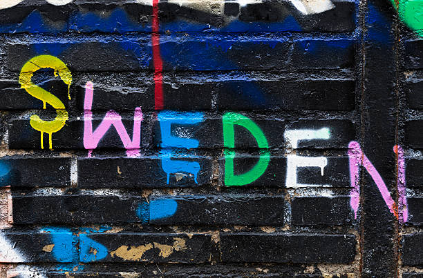 istock Graffiti. Sweden painted illegally on public wall. 187535516