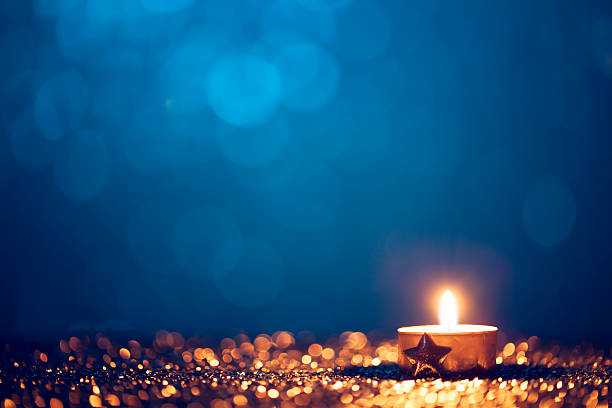 istock Christmas Tea Light - Candle Bokeh Defocused Decoration Gold 187535786