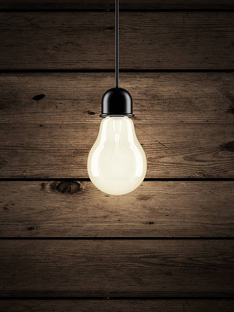 istock bulb on the wooden background 187536342